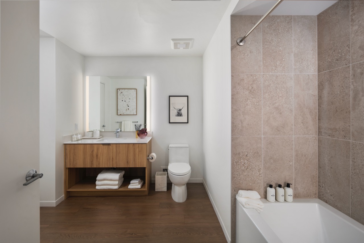 bathroom with vanity and shower